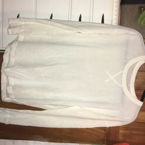 White sweater.
